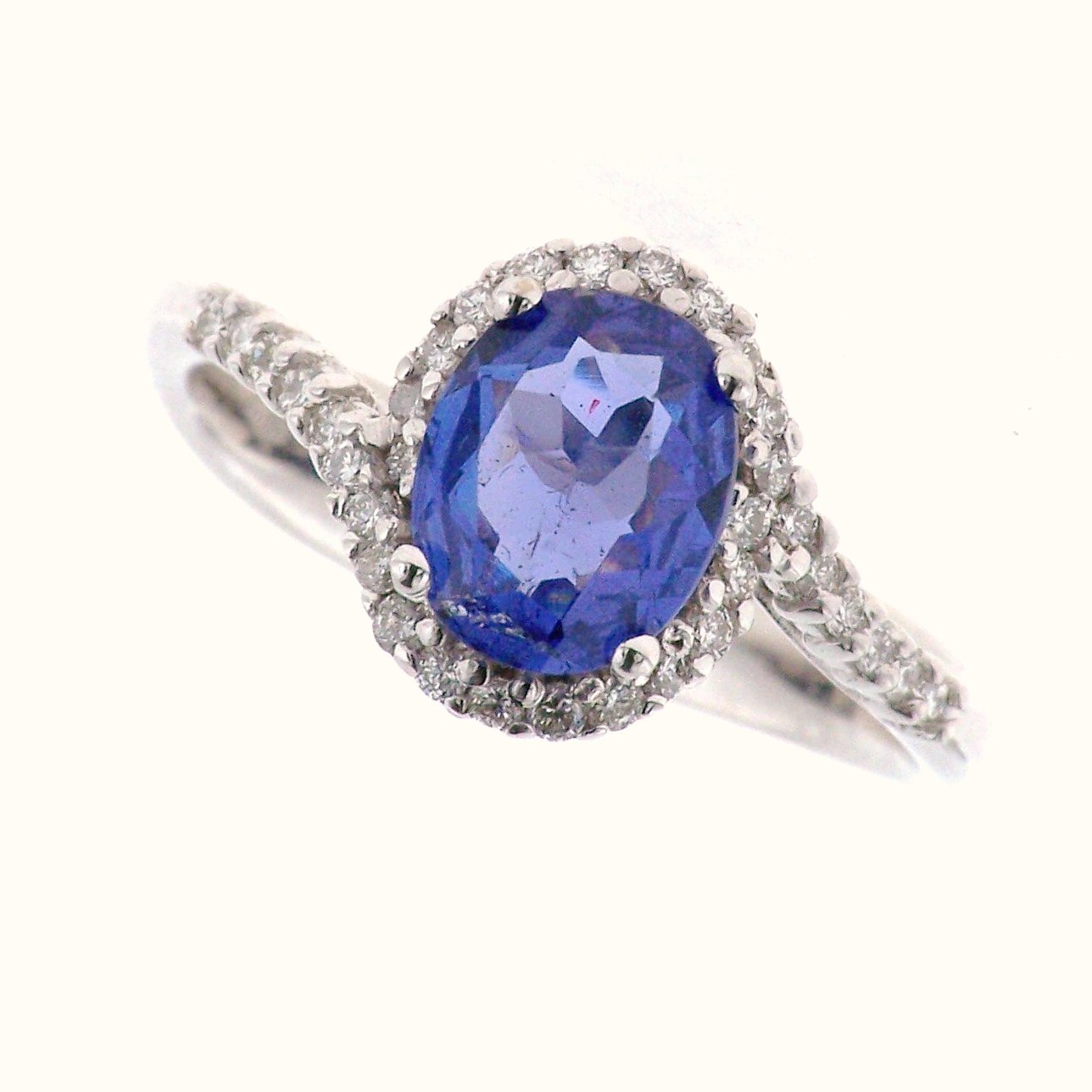 ANELLO IN ORO BIANCO E DIAMANTI NATURALI E TANZANITE NATURALE